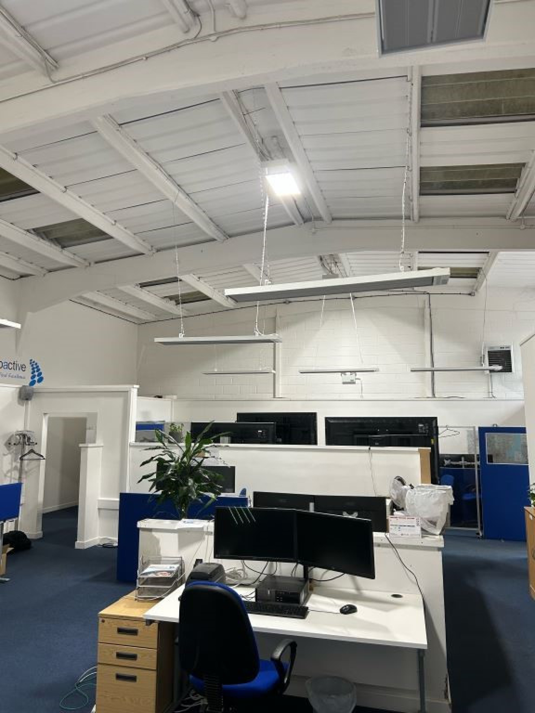 suspended medium wave infrared heater over desk