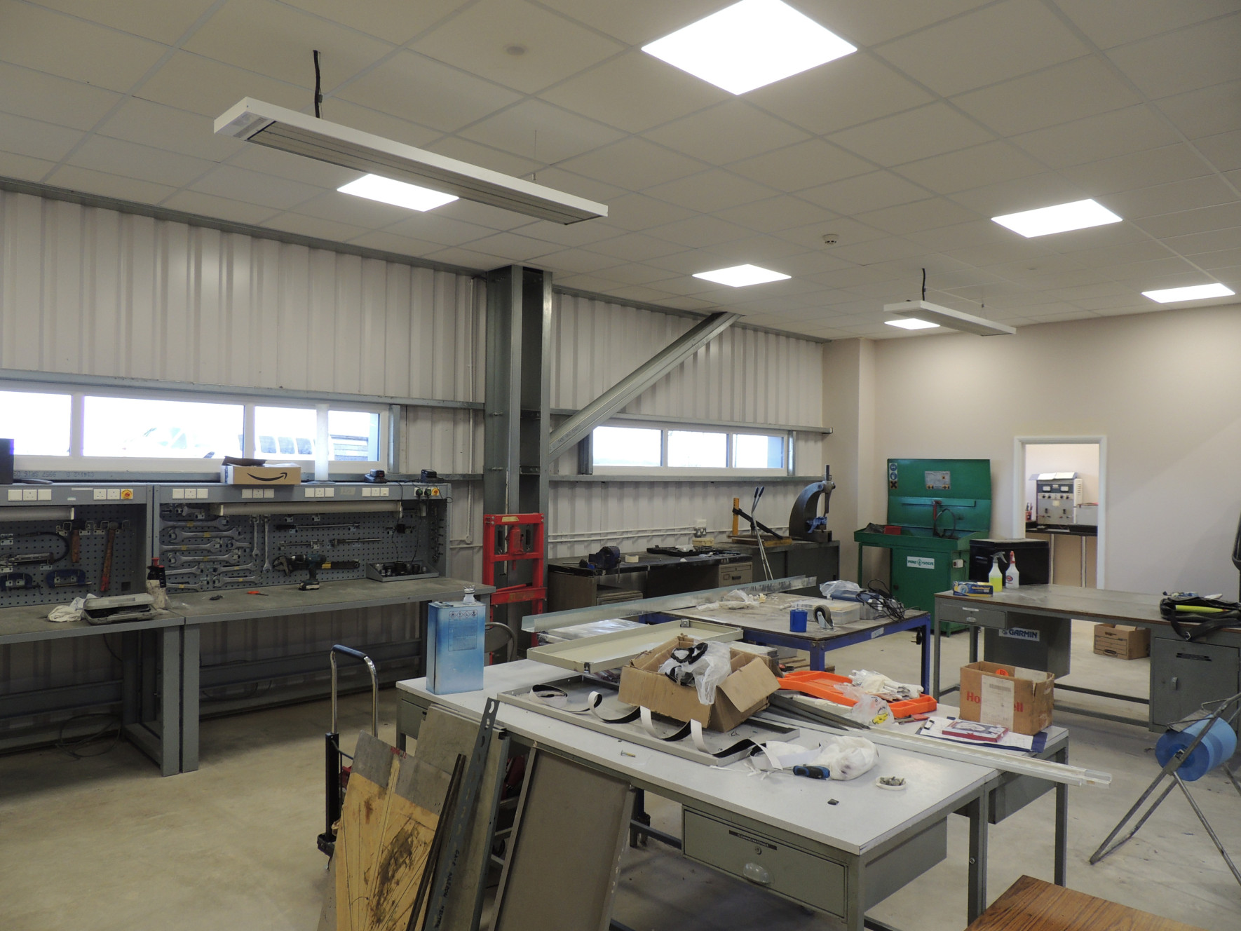 Ceiling Mounted medium wave infrared heaters in workshop