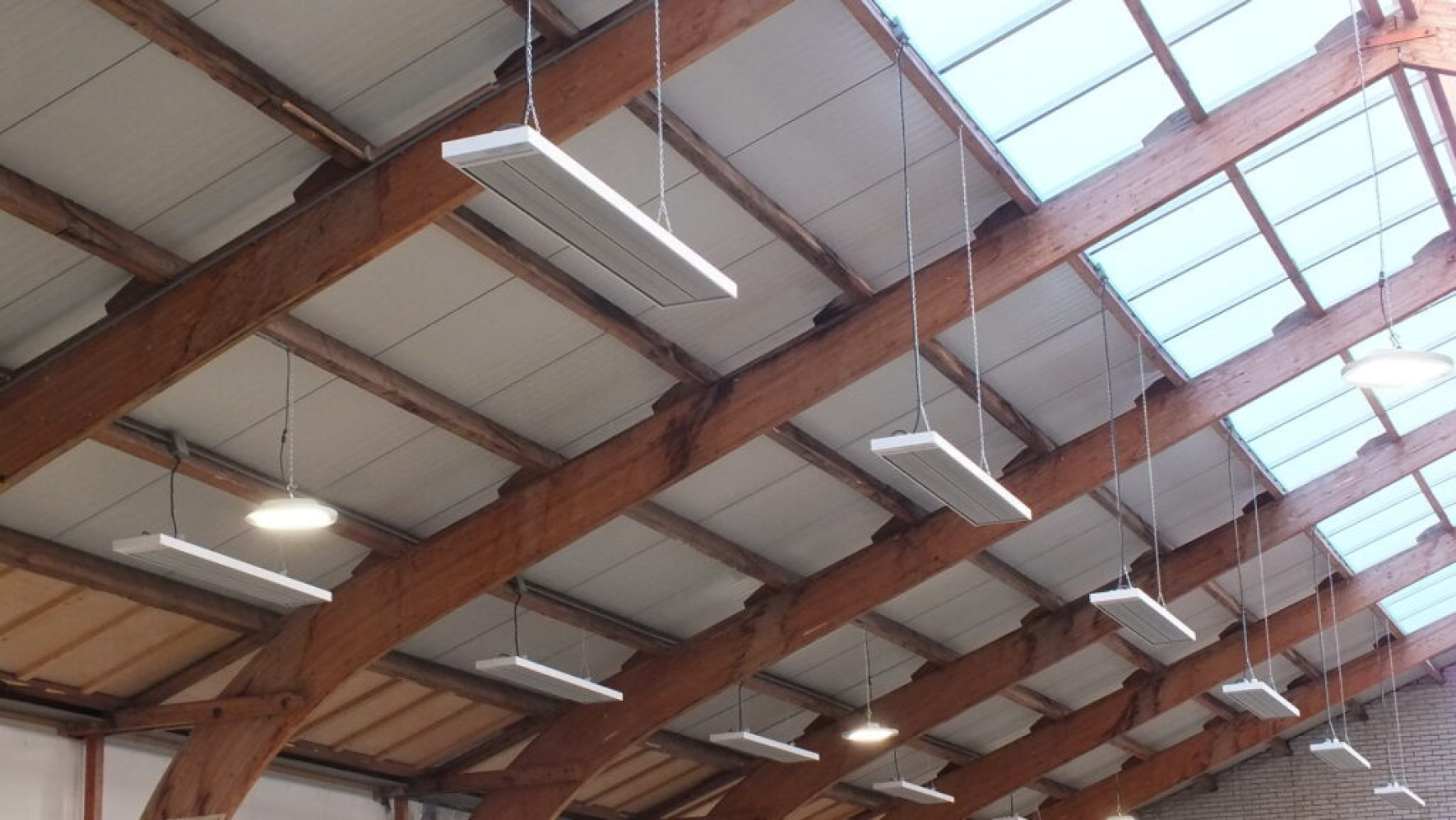 Ceiling Suspended EEZ Heaters for ambient heating in warehouse setting