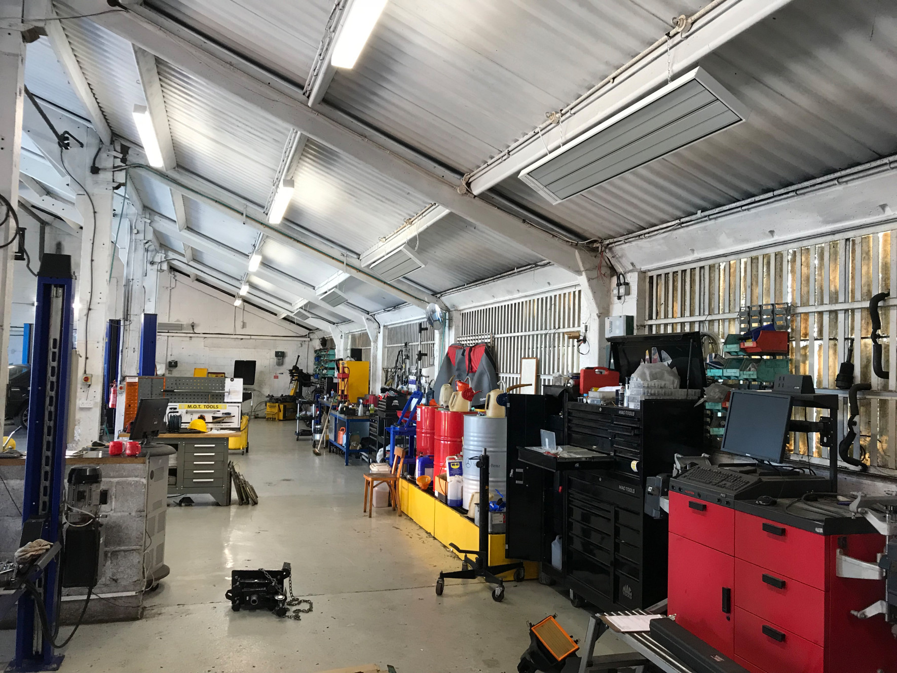 Suspended EEZ heaters in a garage workshop